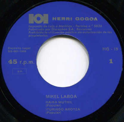 Mikel Laboa – Haika Mutil - Ituringo Arotza - Zure Begiek - Zilbor Hesteak - 7" - 1969 - Herri Gogoa – HG-15 - Incluye Hoja Interior con las Letras - Vinilo Muy Buen Estado / Portada Muy Buen Estado (VG+/VG+).