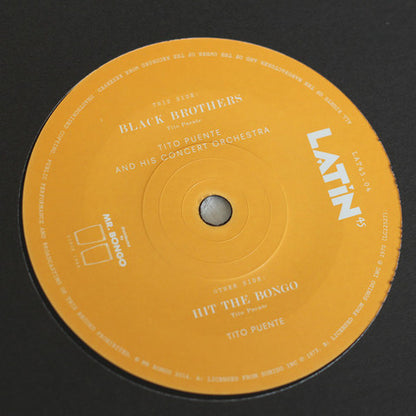 Tito Puente – Black Brothers / Hit The Bongo - 7" - 2014 - Mr Bongo – LAT45.04 - Vinyl Near Mint / Cover Near Mint (M-/M-).