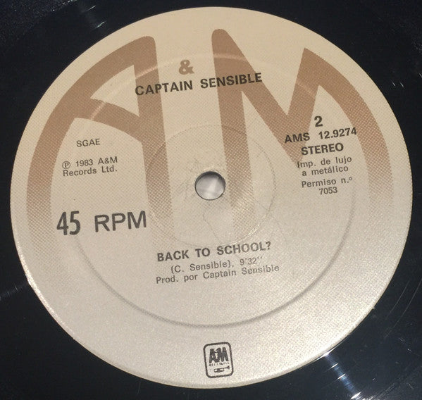 Captain Sensible – Stop The World - 12", 45 RPM, Maxi-Single - Spanish Edition. 1983 - A&M Records – AMS 12-9274 - Vinyl Near Mint (M-) / Sleeve Very Good (VG)